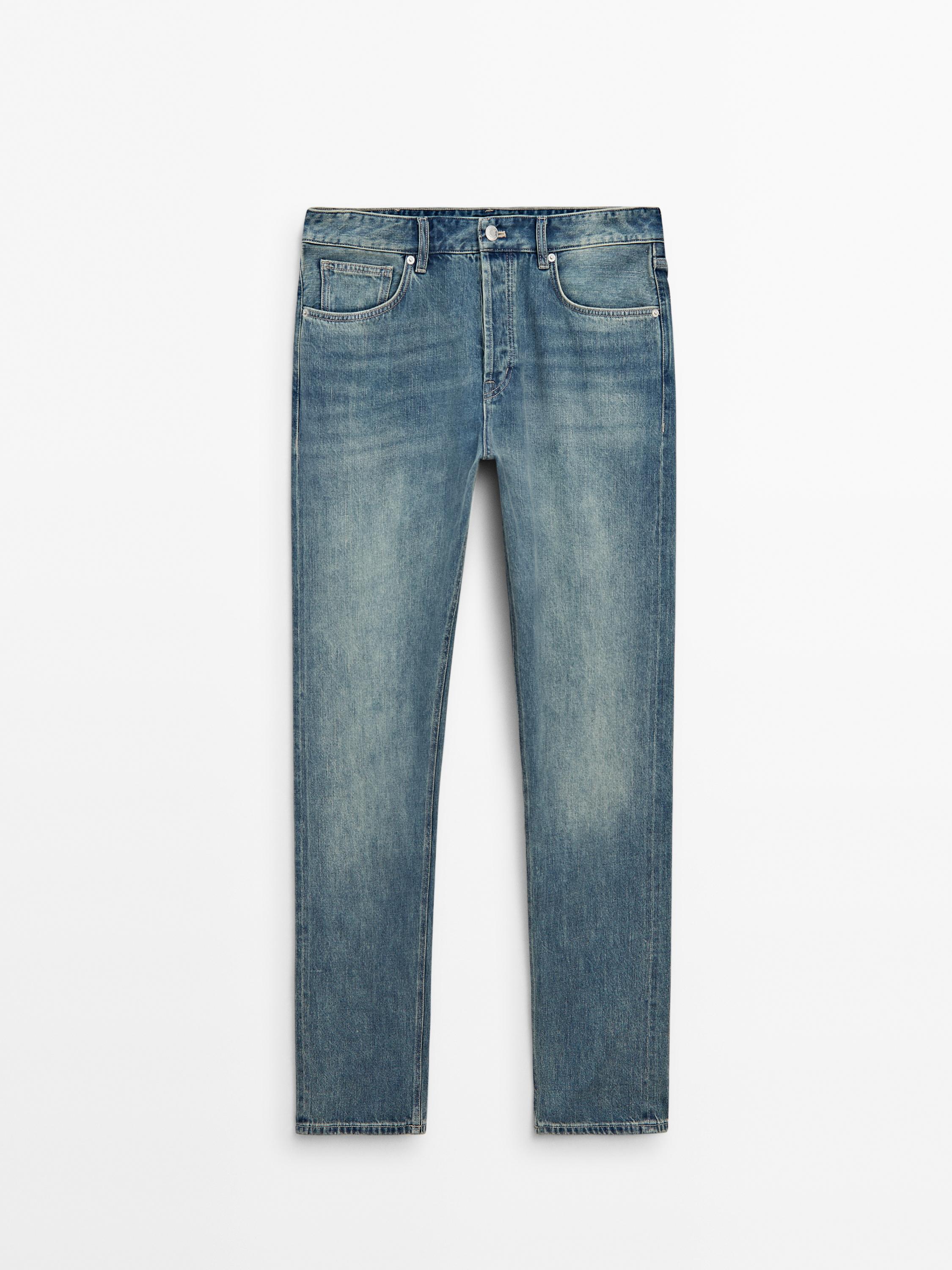 JEANS TAPERED FIT STONE WASH