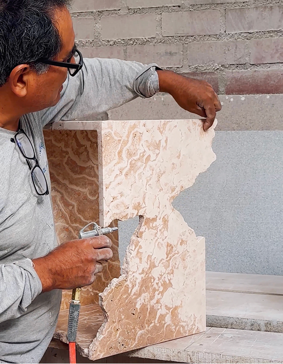 Craftsman carving travertine RF Studio Salone Milan 2026