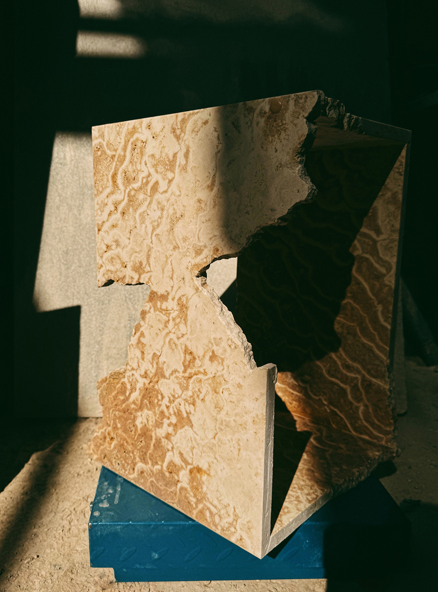 RF Studio travertine sculpture with light and shadow play, Salone de Milan 2026