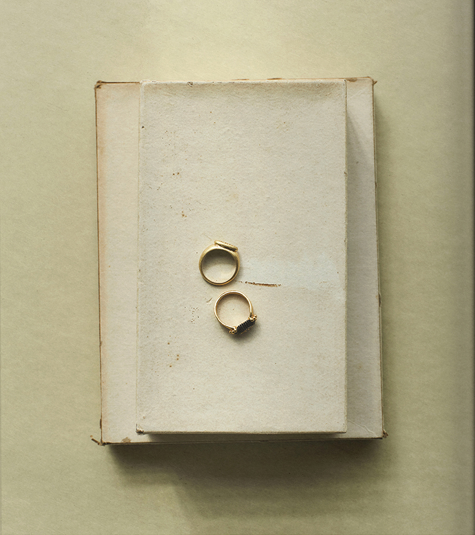 Shine ring set on an antique book