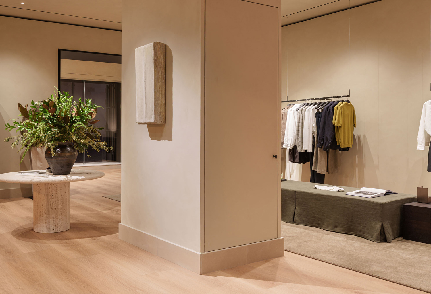 Massimo Dutti Mallorca store interior with display unit and plant