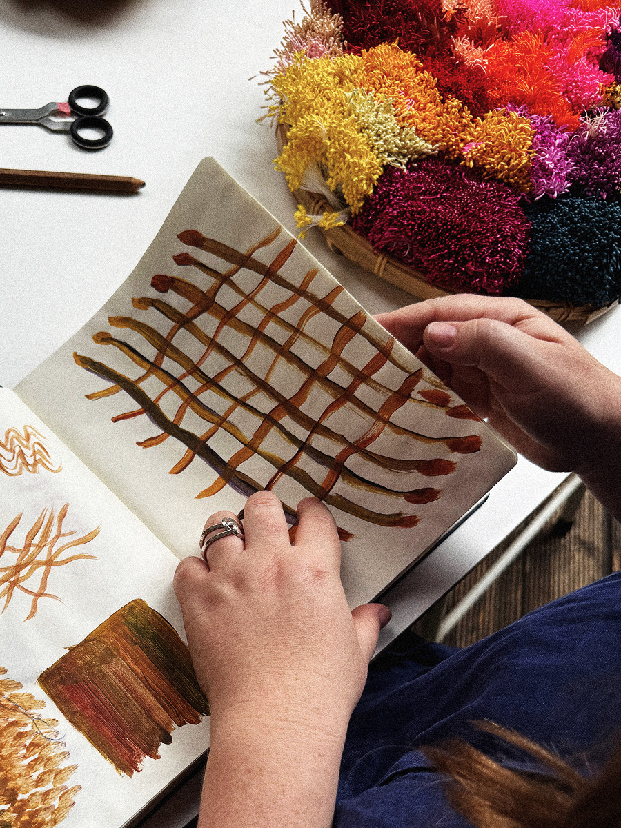 Luz Moreno Pinart working on the research notebook