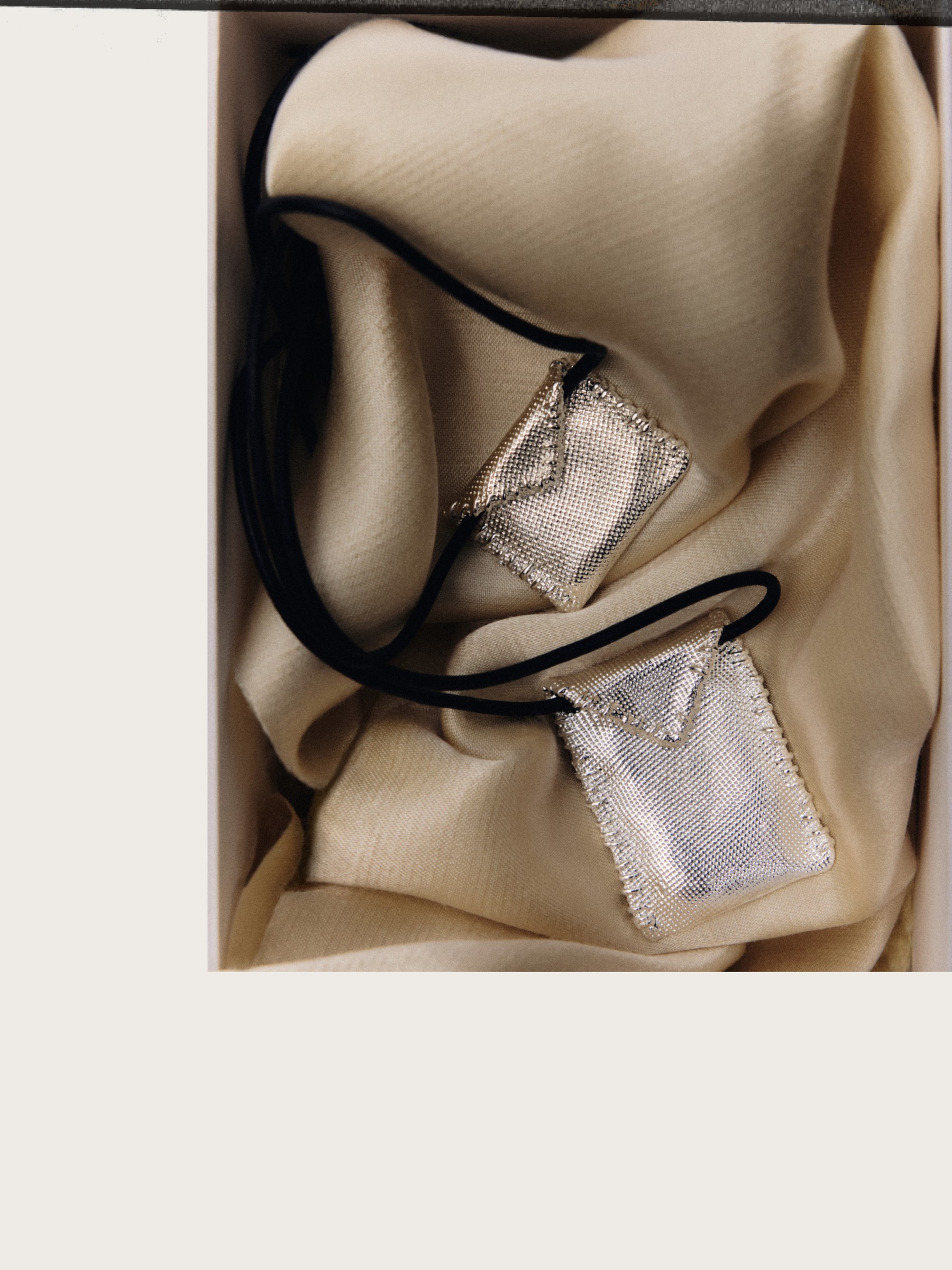 Cord necklace with metal mesh envelopes — Massimo Dutti