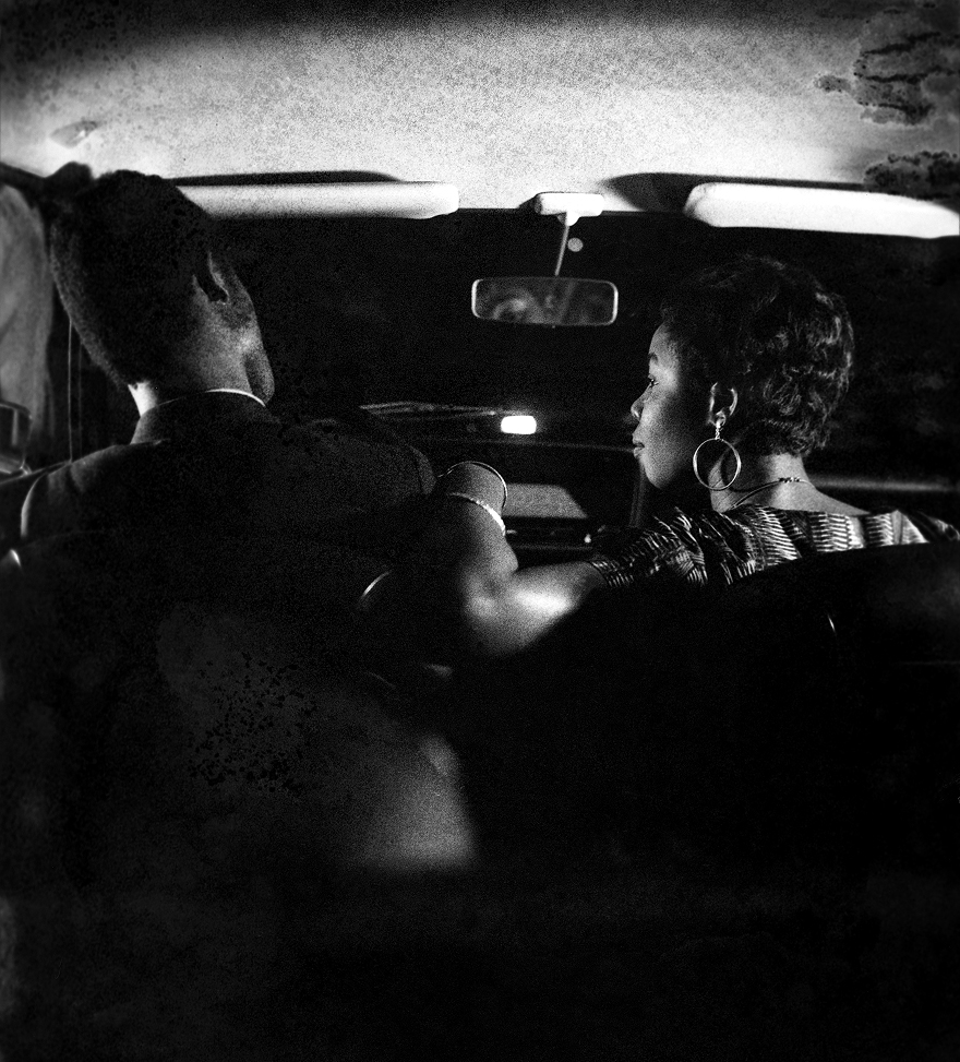 Couple inside a car at night, photograph by Paul Kodjo — Massimo Dutti
