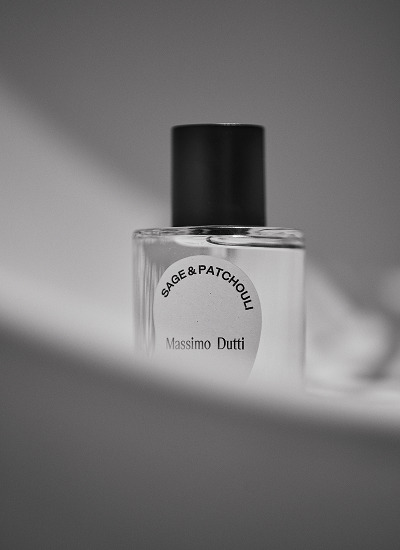 Sage & Patchouli bottle in black and white against a gradient background — Massimo Dutti