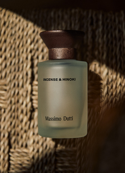 Incense & Hinoki bottle on a woven surface — Massimo Dutti