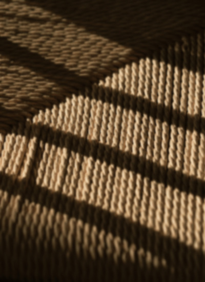 Filtered light over a woven fabric — Incense & Hinoki, Massimo Dutti