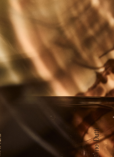 Blurred amber reflection — Leather Mirage, Massimo Dutti