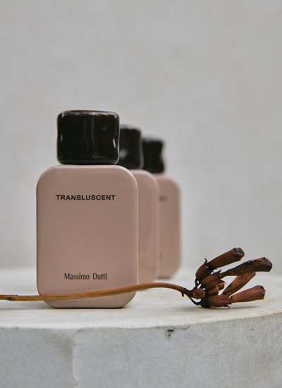Two Translucent bottles on a stone plinth — Massimo Dutti