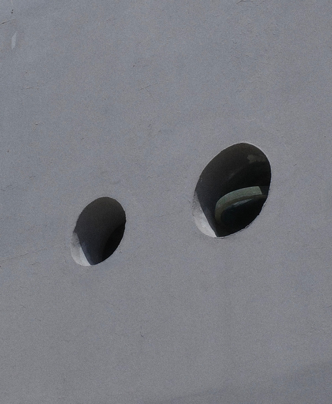 Concrete surface with two openings — Echoes of a Place, Arale Reartes' playlist for Massimo Dutti