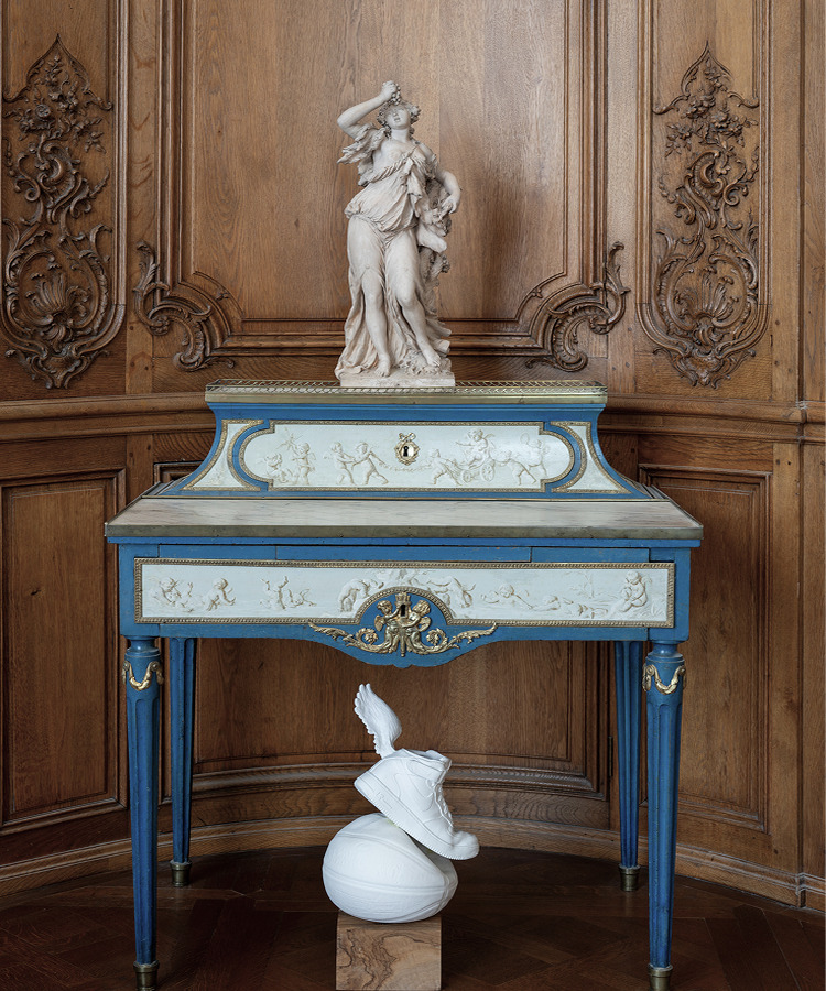 Sculpted sneaker and ball beneath a Louis XVI console — We are (still) Here, Petit Palais