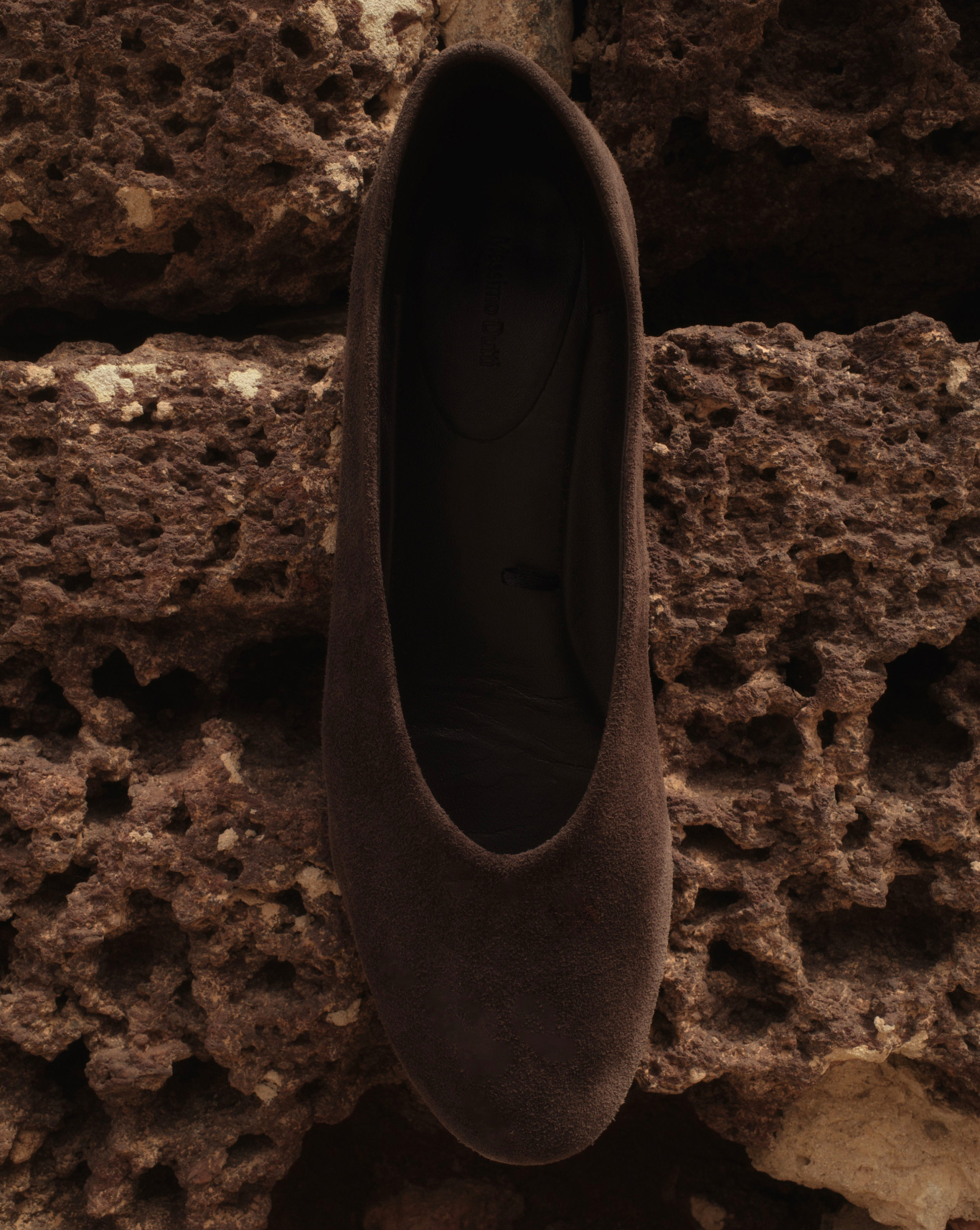 Brown suede heeled shoe on volcanic rock — Massimo Dutti