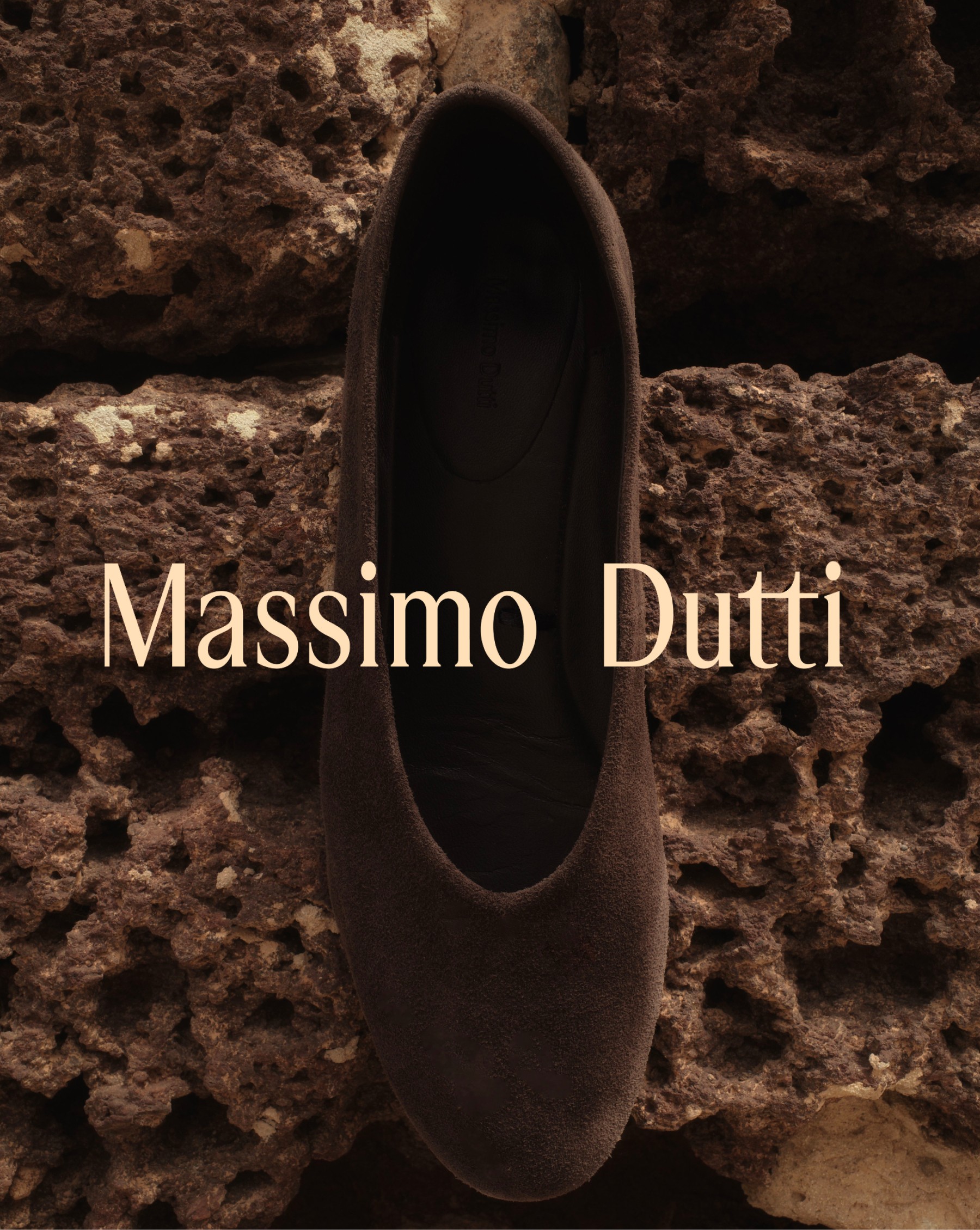 Brown suede heeled shoe on volcanic rock — Massimo Dutti