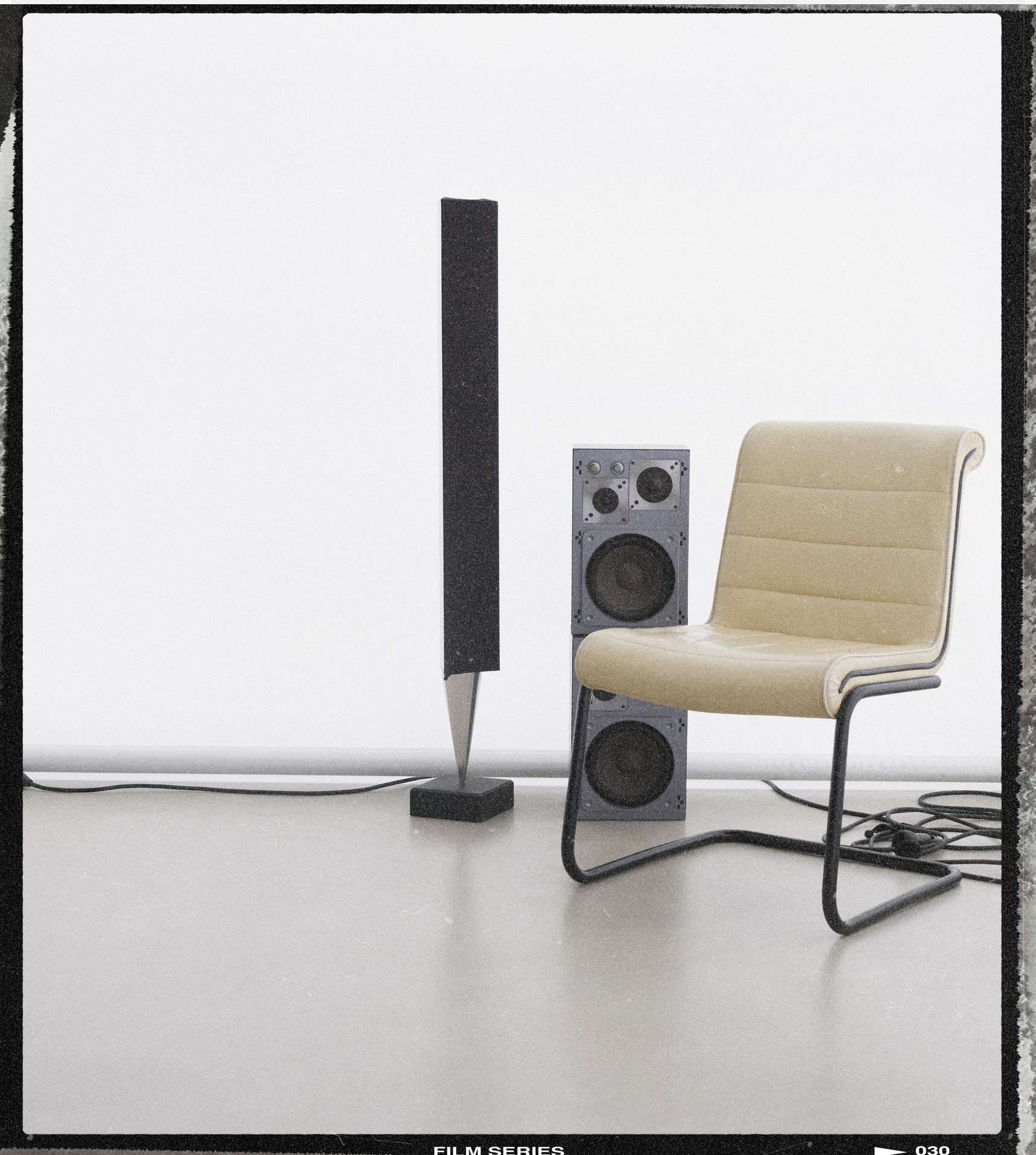 Set design by Giovanna Martial on a film frame: leather chair, speakers and sound column — Massimo Dutti