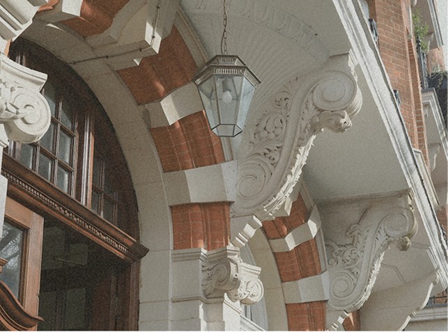 Ornamental terracotta detail and a lamp post in Bloomsbury — Massimo Dutti London Fashion Week