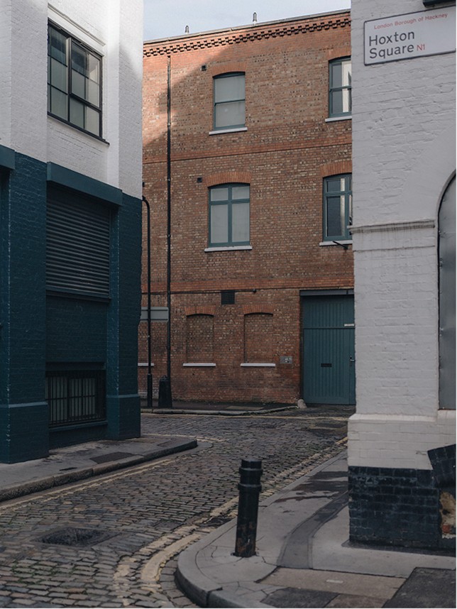 Cobbled street with brick façades by Hoxton Square — Massimo Dutti London Fashion Week