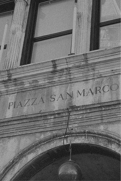 Piazza San Marco inscription above an arch, in black and white — Massimo Dutti Milan Fashion Week
