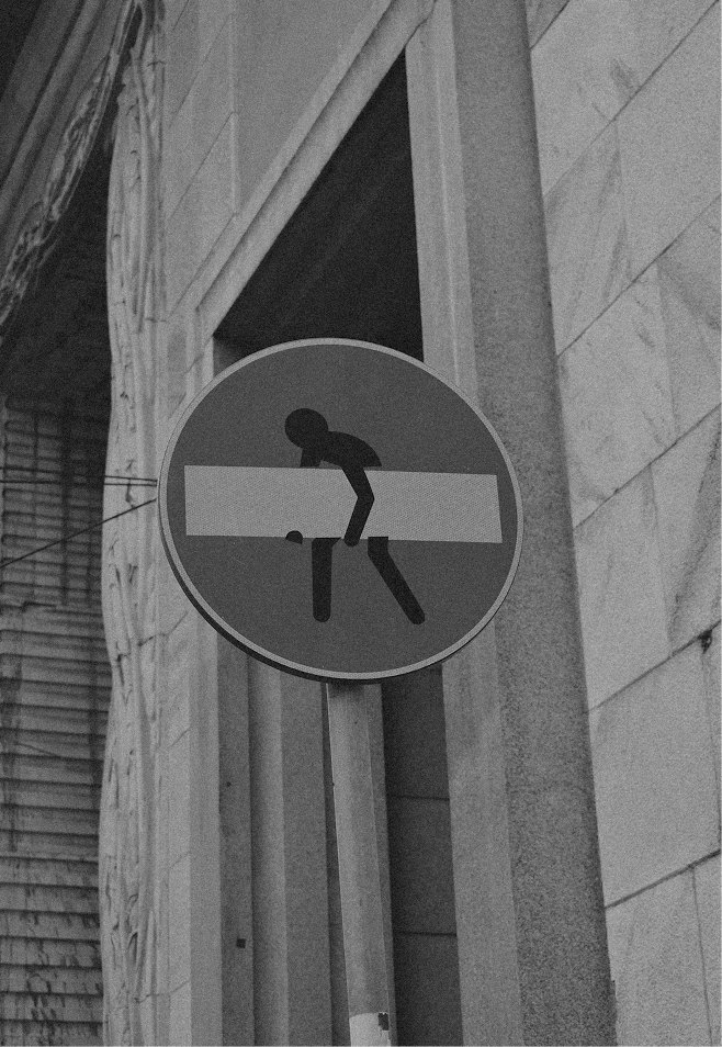 Traffic sign reworked as street art, in black and white — Massimo Dutti Milan Fashion Week