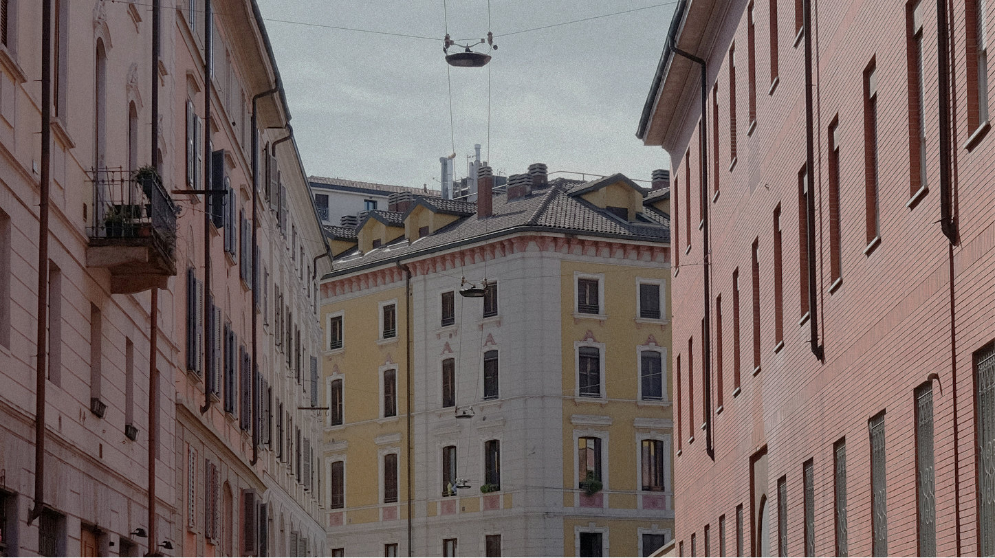 Pink and yellow residential façades on a Milan street — Massimo Dutti Milan Fashion Week