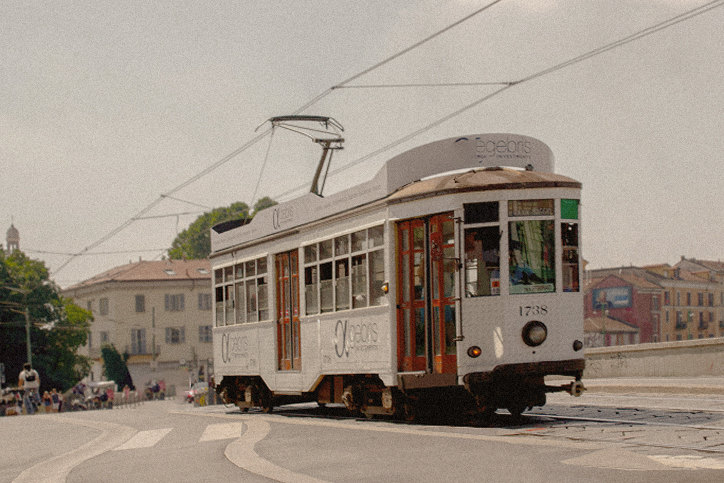 Historic white tram running through Milan — Massimo Dutti Milan Fashion Week