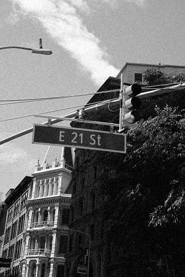 East 21st Street sign with façades behind — Massimo Dutti NY Fashion Week
