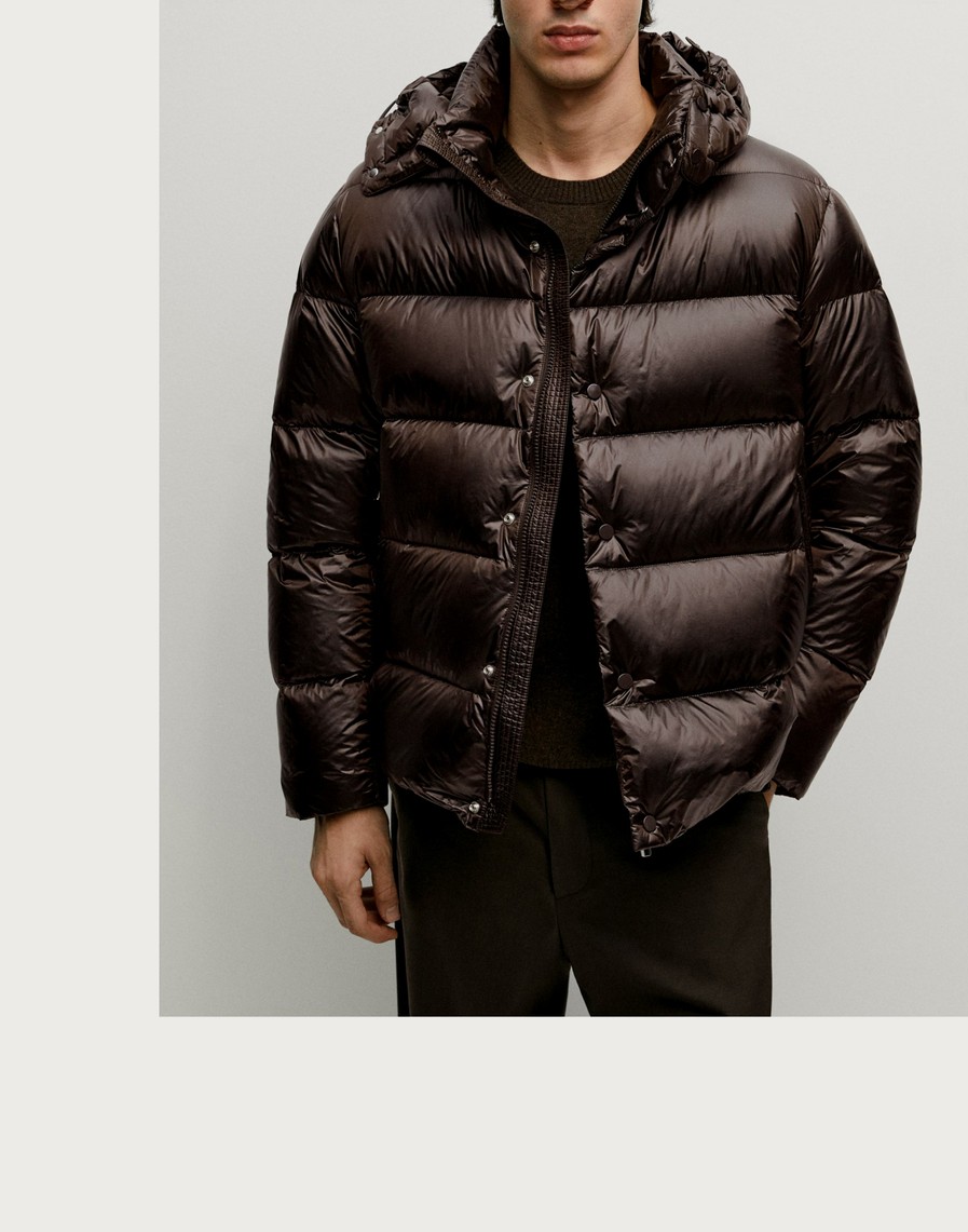 Man wearing a brown high-shine puffer jacket — Massimo Dutti Puffer Jackets