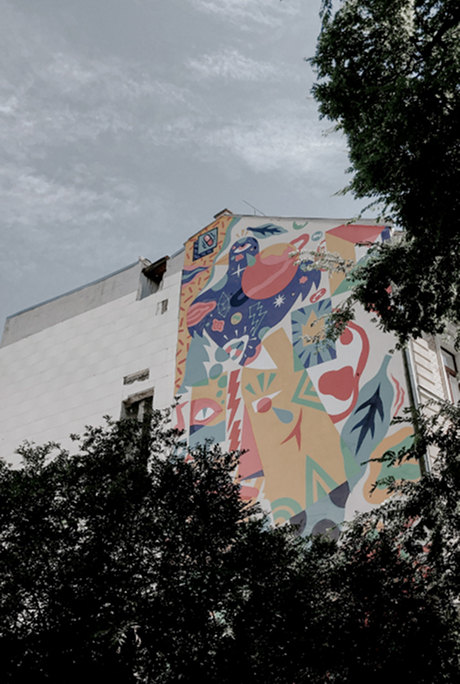Colourful mural among the trees of Belleville — Massimo Dutti Paris Fashion Week