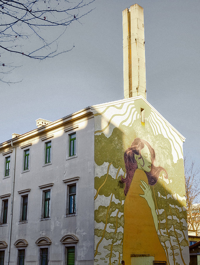 Street art mural on a building façade in Belleville — Massimo Dutti Paris Fashion Week
