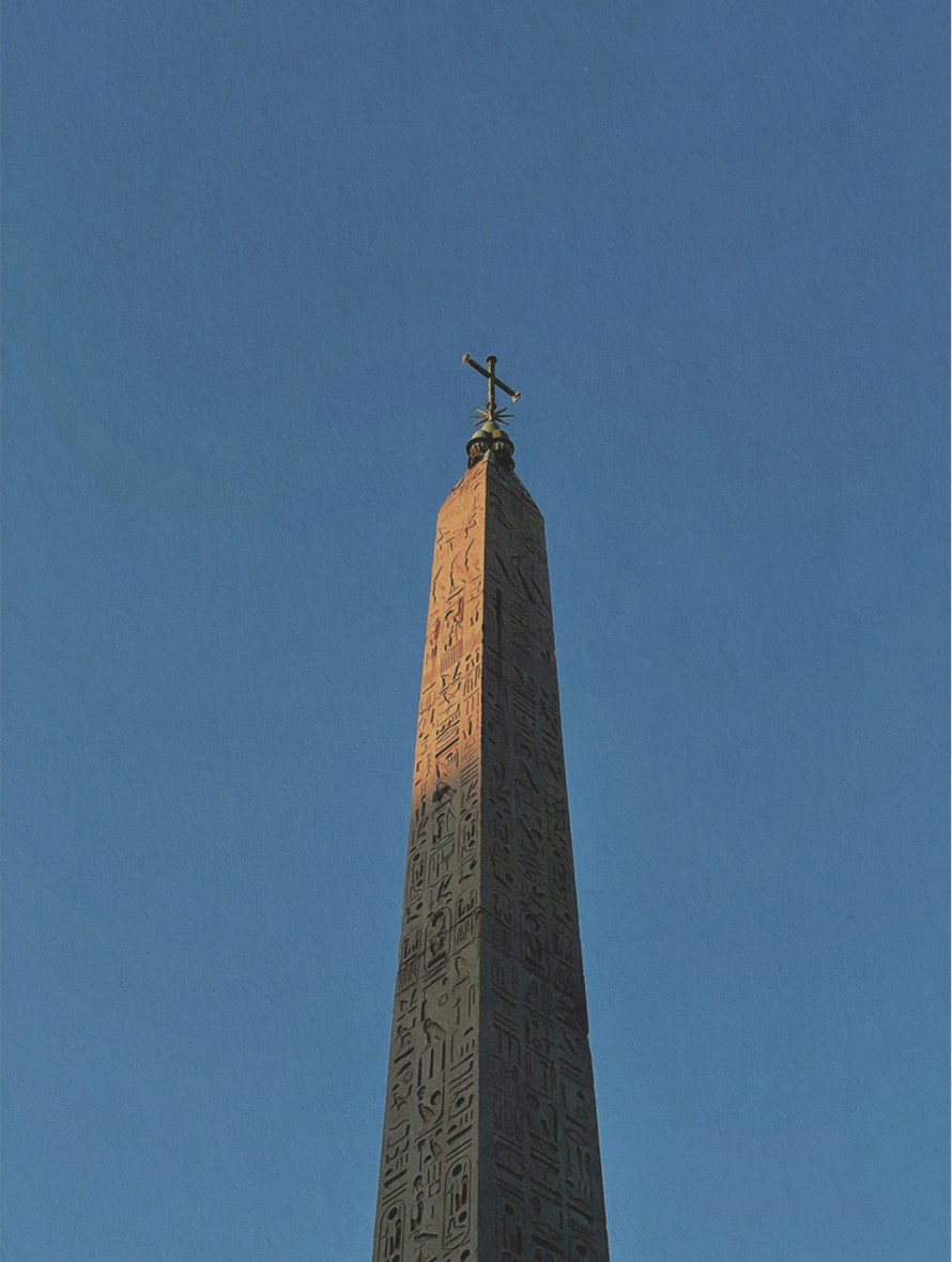 The obelisk of Piazza del Popolo against a blue sky — Rome