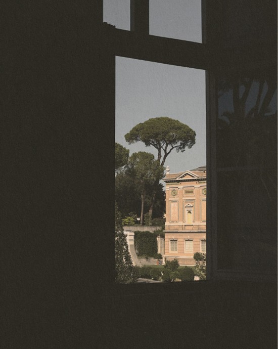 Window overlooking the rooftops of Rome
