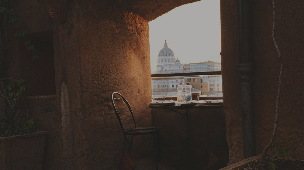 Window with a view of the dome of St Peter's — Rome