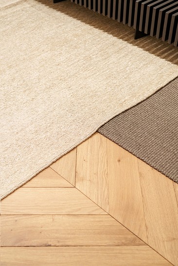 Wool rugs on herringbone oak parquet — Massimo Dutti Rome