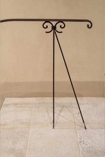 Wrought-iron balustrade above a stone floor — Massimo Dutti Rome