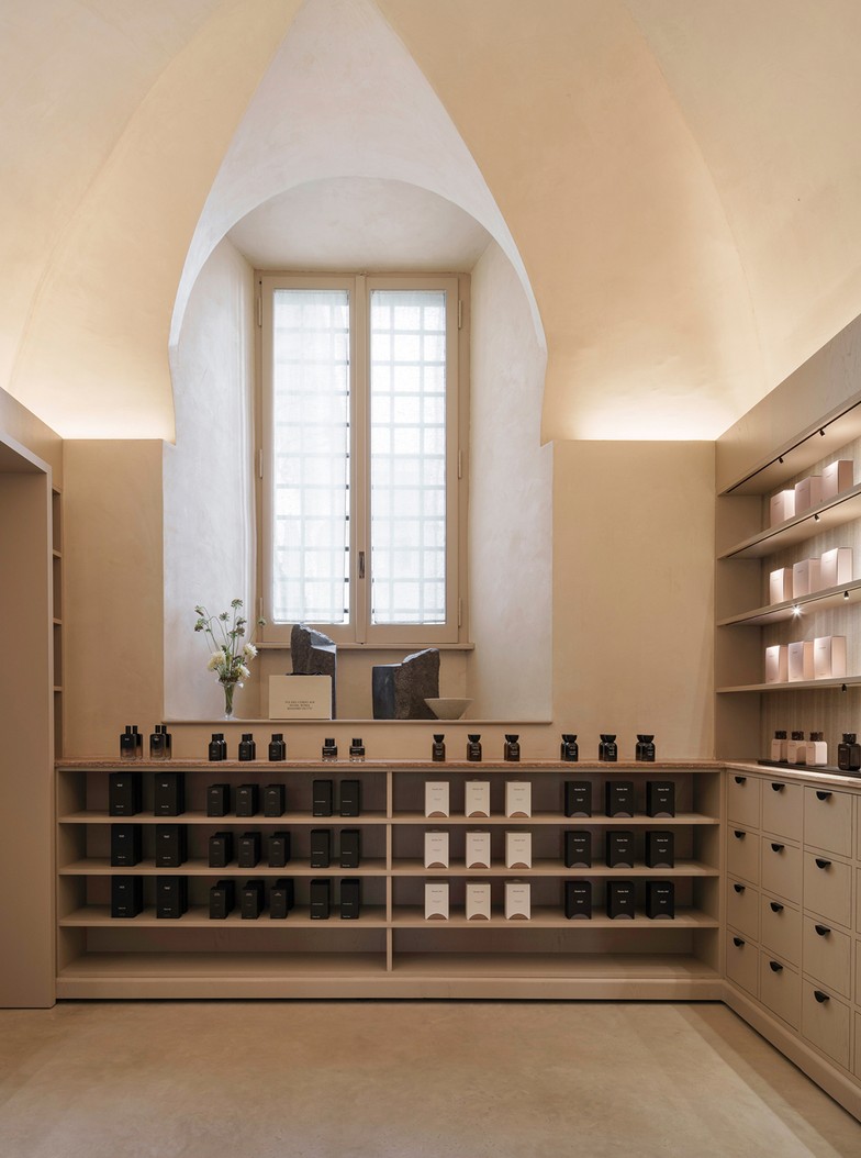 The Perfumes Room, a vaulted room with a window and perfume shelves — Massimo Dutti Rome