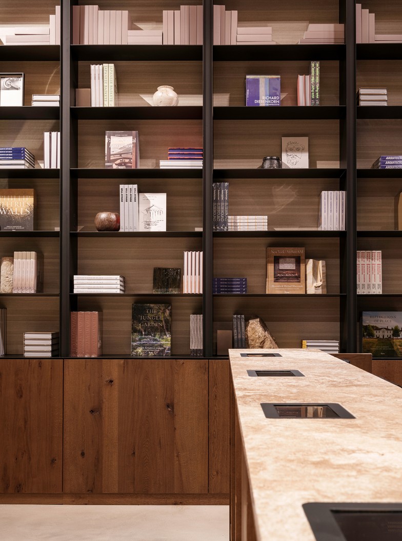 Detail of books and objects on the bookshop shelves — Massimo Dutti Rome