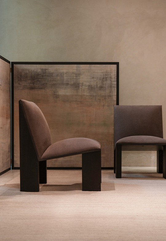 Two brown velvet armchairs in front of a fabric screen — Massimo Dutti Rome